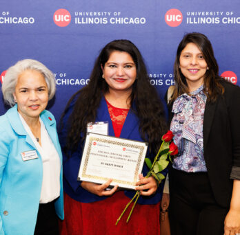 From left to right: UIC chancellor Marie Lynn Miranda, Rudri Purohit and Tanvi Bhatt at the UIC  at the Awards Ceremony.
                  