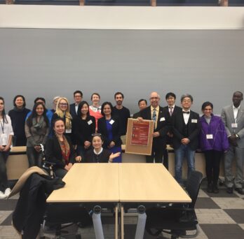 Yolanda Suarez-Balcazar and Fabricio Balcazar with attendees of a workshop
                  