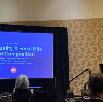 Photo of Manoela Lima Oliveira giving an oral presentation at the ASPO 2023 meeting, San Diego, CA.
                  