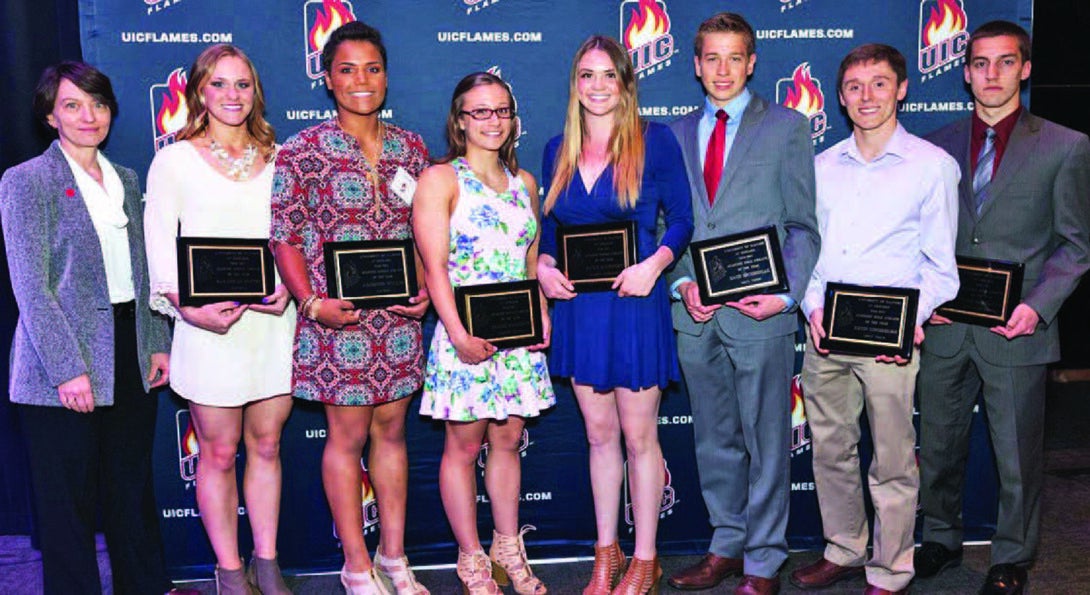 Provost Susan Poser with student-athletes who achieved a 4.0 GPA for the past three semesters: (from left) Savannah Soppet, Jasmine Willis, Claire Haggerty, Riley Mahoney, Zach Sczesniak, Kevin Ziegenhorn and Alex Bashqawi.