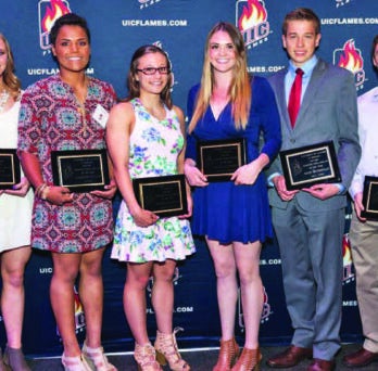 Provost Susan Poser with student-athletes who achieved a 4.0 GPA for the past three semesters: (from left) Savannah Soppet, Jasmine Willis, Claire Haggerty, Riley Mahoney, Zach Sczesniak, Kevin Ziegenhorn and Alex Bashqawi.
                  