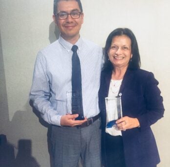 Yolanda Suarez-Balcazar (right) is pictured with her mentee, Noe Chavez, assistant professor at the Charles Drew University of Medicine and Science in Los Angeles, immediately after being presented with the award.
                  